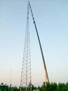 Crane placing high tower